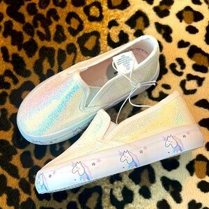 SOLD. NWOT Iridescent shimmer w/ unicorn detail soles slip